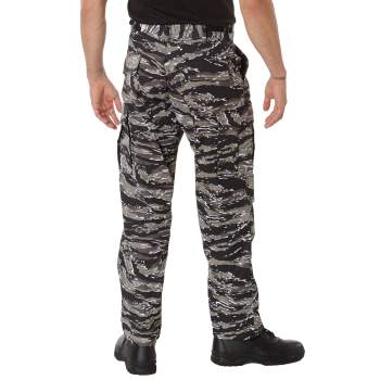 Army fatigue pants with red top stripe